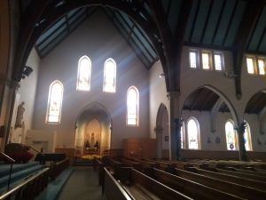 Light shining through the windows over the Mary shrine