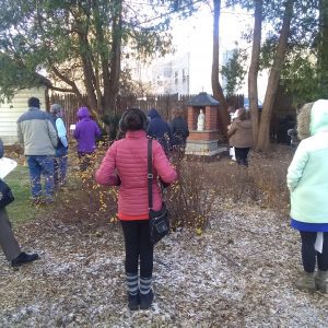 People gather outside for the blessing of the Mary Shrine
