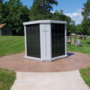 sidewalk leading up to Columbarium in a cemetery