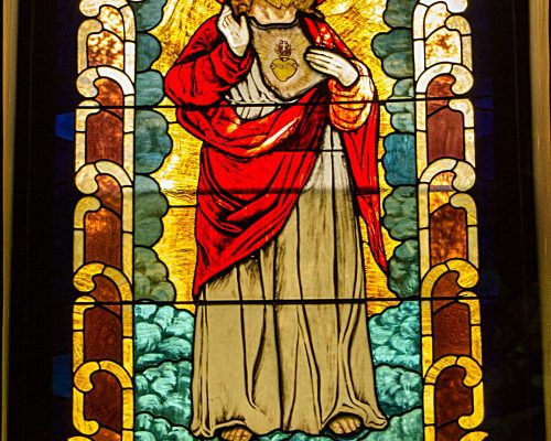 Stained glass window: Donated by Margaret Burns Sr. in memory of James Burns