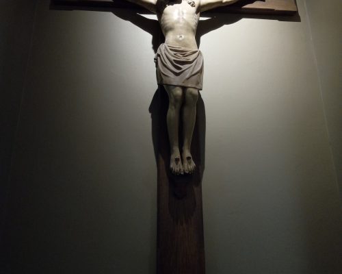 A sculpture of Jesus on the cross.