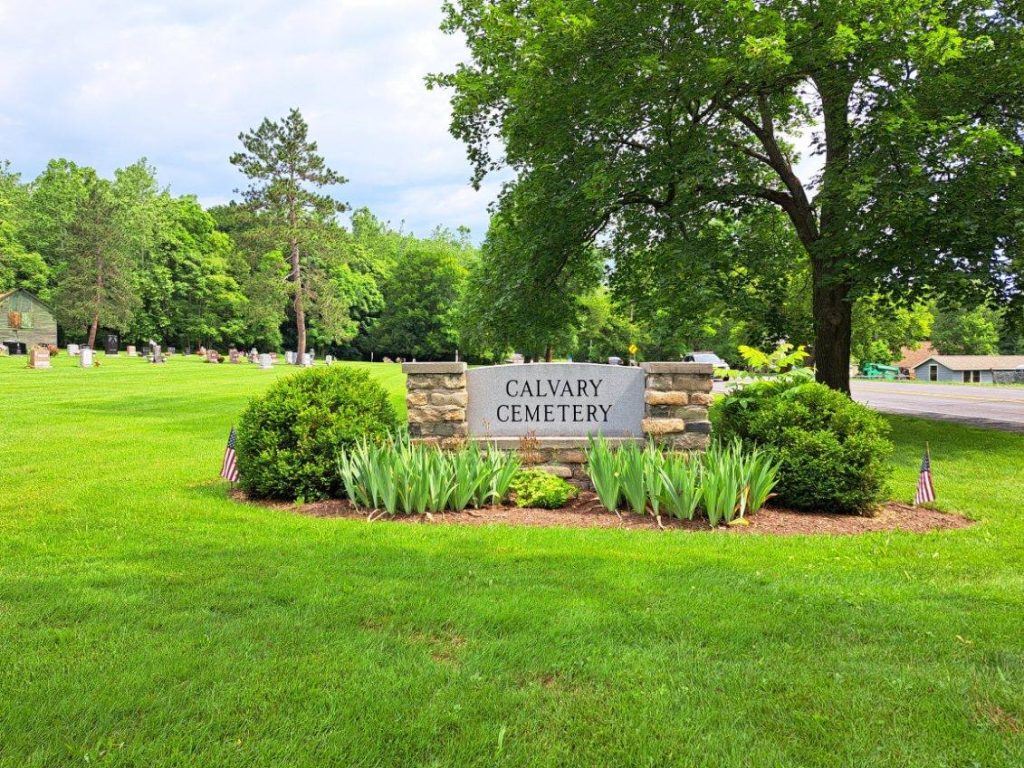 Calvary Cemetery entrance in July