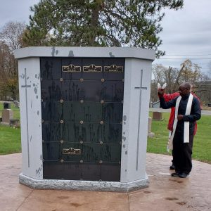 Priest blesses Columbarium